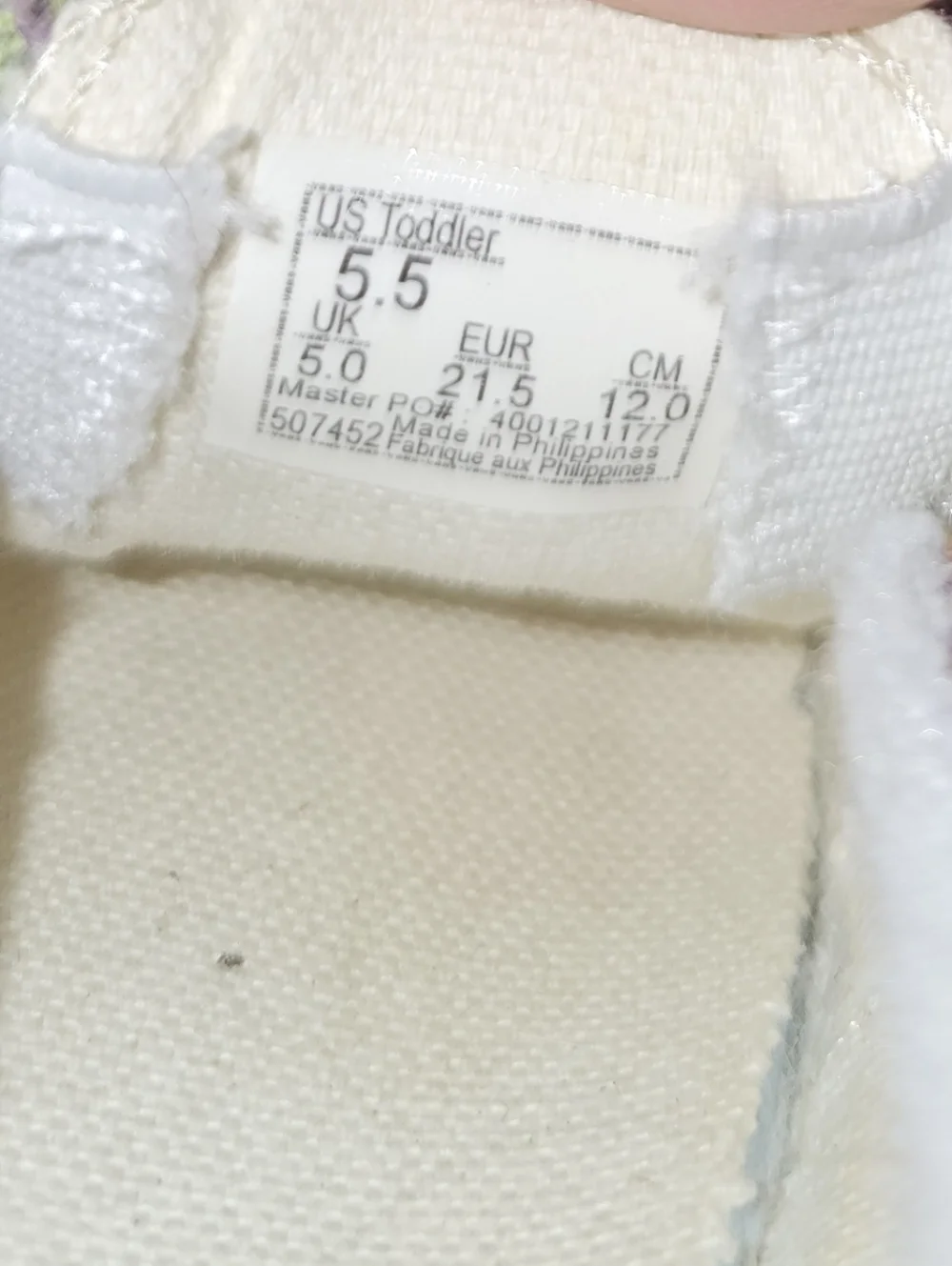 Vans Slip-On V Alpaca sneakers featuring a faux fur llama design.